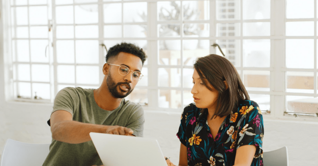 Managers discussing community platform