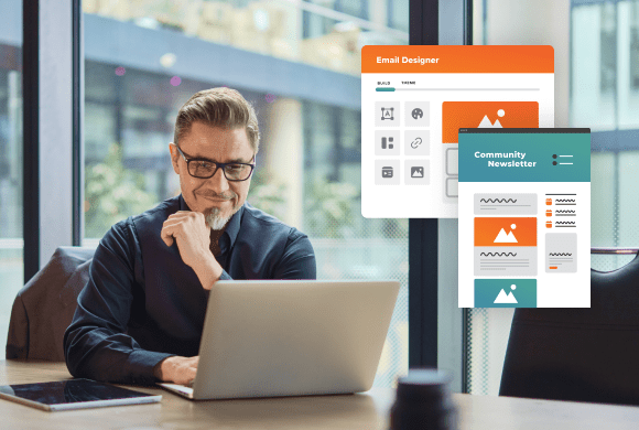Man using his laptop next to a visualization of Higher Logic’s email designer and community newsletters